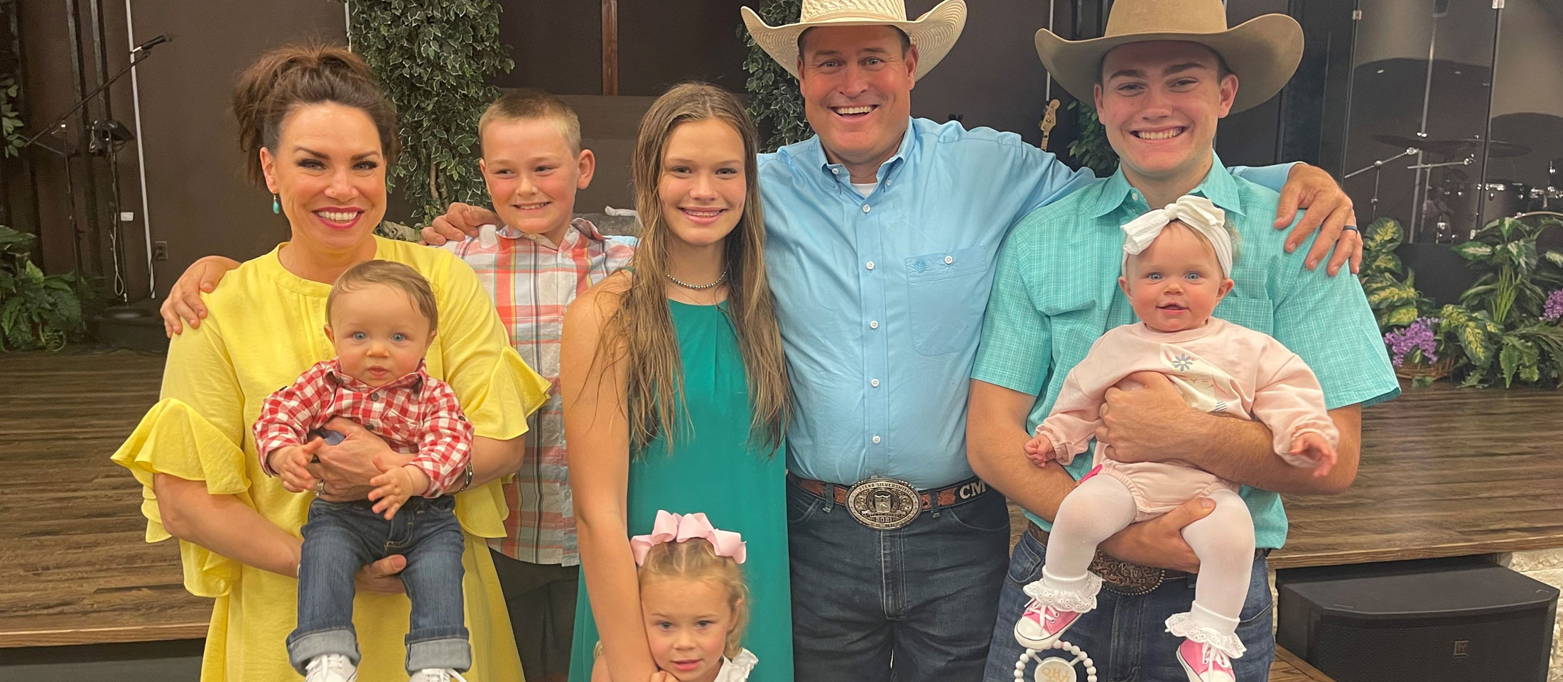 All-Around Cowboy, Cash Myers, and his family smile for a picture.